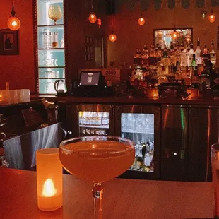 a bar with a candle