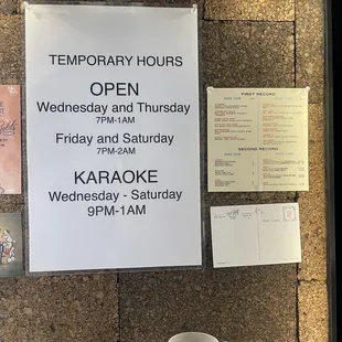 two coffee mugs and a menu