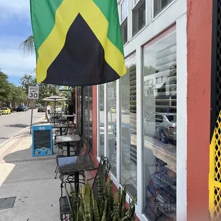 a jamaican flag hanging outside