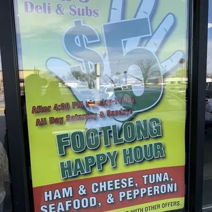 a sign for a happy hour