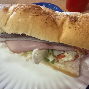 6 inch clubhouse with American on White Parmesan.