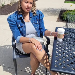 Enjoying a caramel latte outside on a spring day