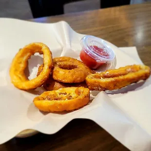 Side  of onion rings. A little greasy but yummy