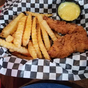 Lunch portion chicken tenders with crinkle cut fries