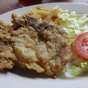 Pork chop and fresh cut fries