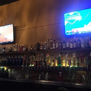 They offer beer in bottles and on tap, plus they offer wine and mixed drinks.