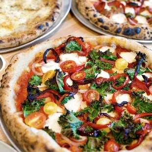 three different types of pizza