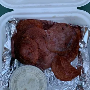 meat in a styrofoam container
