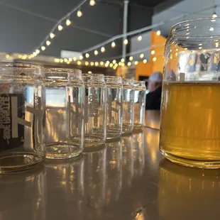 Hustle Juice with an empty glasses from flight