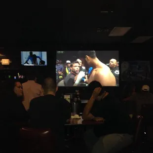 One of the massive TV screens at Side Pockets