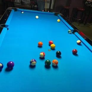 a pool table with eight balls