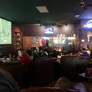 a group of people watching a football game