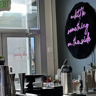 Part of the entry, barista bar and "... a little something on the side."
