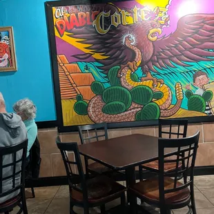 a mural of an eagle on the wall