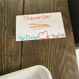 a thank you note on a table