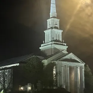 a church lit up at night
