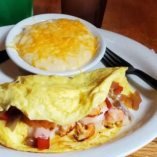 Cajun omelette and cheese grits