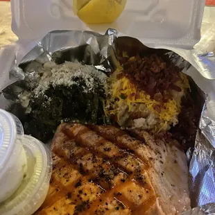 Grilled Salmon New Orleans with spinach and loaded mashed potatoes