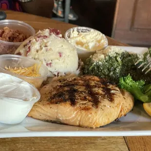 Grilled Salmon with steamed vegetables and loaded garlic potatoes