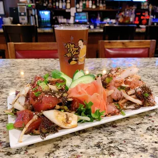 Our Poke Combo (Fresh Ahi Poke &amp; Spicy Kajiki Poke) paired with Side Street's Rogue Beer!
