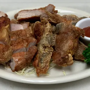 Our Famous Pan Fried Island Pork Chops! Crispy on the outside, juicy on the inside!