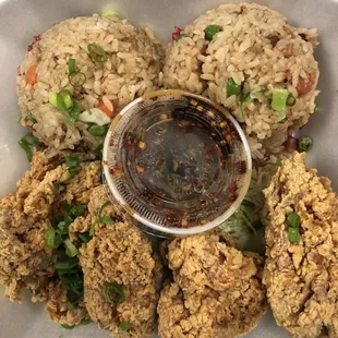 Our Garlic Chicken Plate Lunch on our Curbside Takeout Menu! Comes with 2 scoops of Fried Rice and a choice of Potato Mac or Toss Greens.