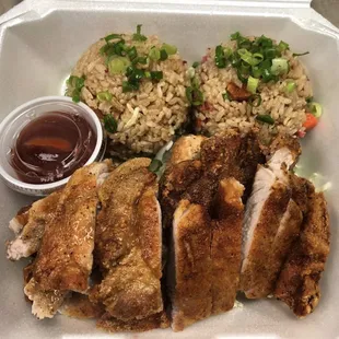 Our Pork Chop Plate Lunch on our Curbside Takeout Menu! Comes with 2 scoops of Fried Rice and a choice of Potato Mac or Toss Greens.