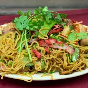 "Side" Soba.Yakisoba with snow peas, shiitake mushrooms, asian vegetables, fishcake, roast pork, oyster sauce, chili garlic, ginger, green o