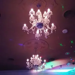 a chandelier in a dimly lit room