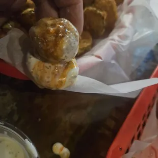 Okra and a friend pickle dipped in hot sauce and French dressing omg