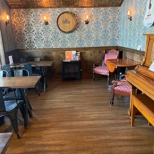 a piano and chairs