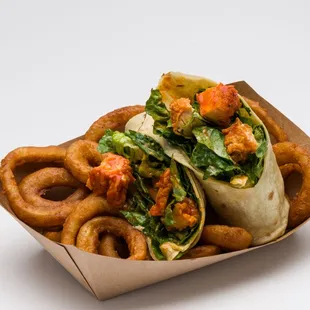 a wrap and onion rings
