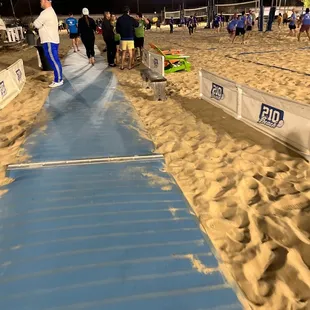 people on the beach at night