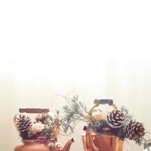 Our flower girls carried vintage copper tea kettles.