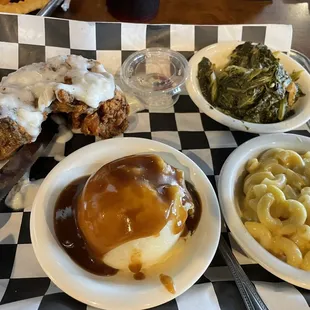 Meat and three - Saturday option (chicken fried chicken). Turnip Greens, Mac and cheese, mashed potatoes and gravy.