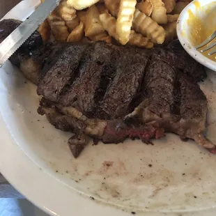 12 oz. steak (very badly cooked and cut)