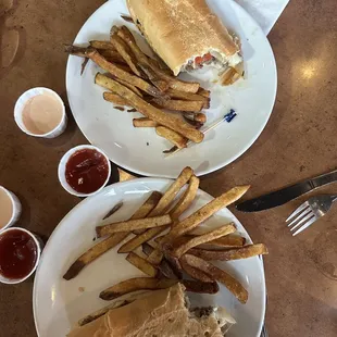 Philly cheese steak sandwich split for sharing