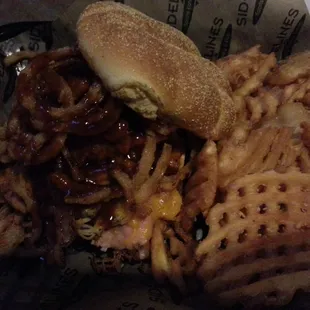 You can't go wrong with their boss hog burger and waffle fries.   The burger had bacon, ham, bbq pork and onion curls.