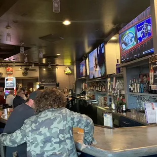people sitting at the bar
