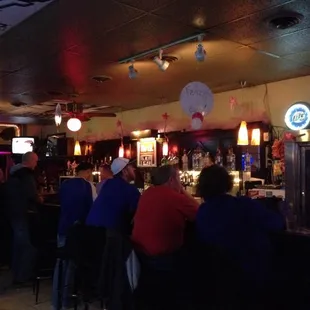 people sitting at the bar