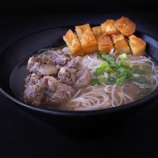 Oxtail pho with savory donut (a trend now in Hanoi)