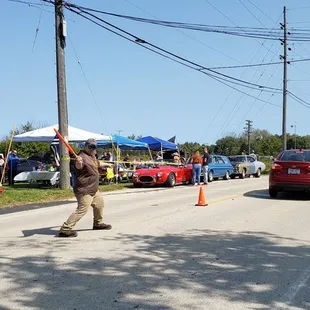 a man on a skateboard in the middle of a street