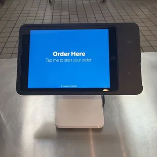 Order on the tablet from Sidewalk Burgers or Kosmos gyros &amp; kabobs