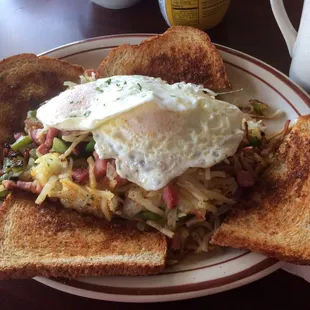 Ham skillet with eggs over easy