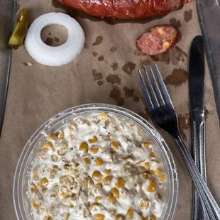 Smoked Cream Corn and 1 Link of Jalapeno Sausage
