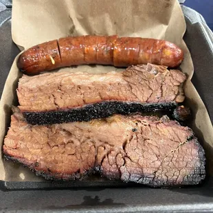 a box of meat and sausages