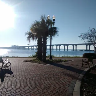 Benches, trees, water, brickwork
