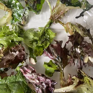 a salad in a plastic container