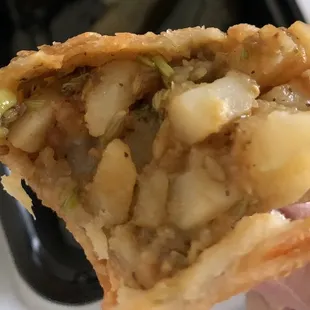 The filling inside- potato &amp; spices. I bought a box of 6 &amp; they were labeled not spicy but they definitely had kick to them.