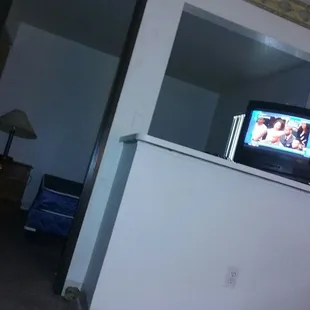 Bit size TV, view from living room. Snug, you get what you pay for.